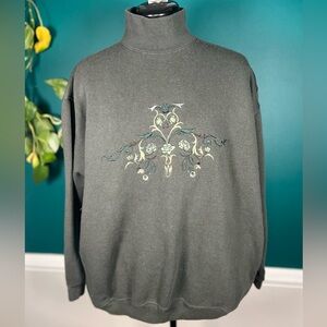 Olive green embroidered turtleneck sweatshirt with pockets